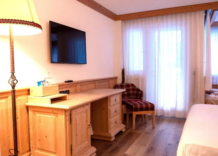 Hotel Grifone Dolomiti 4*