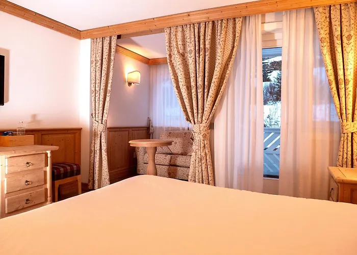 Hotel Grifone Dolomiti 4*